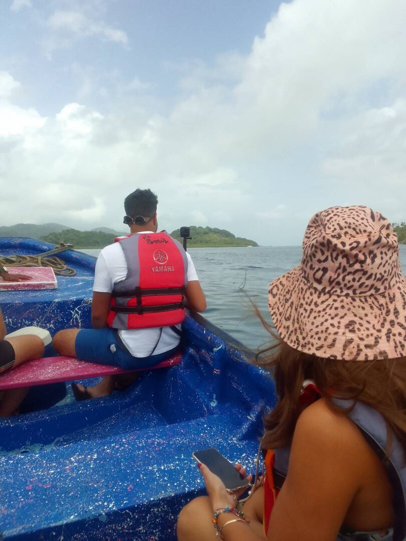 A group of people on boats in the water.